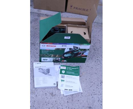 AN AS NEW AND BOXED BOSCH BATTERY POWERED CHAINSAW