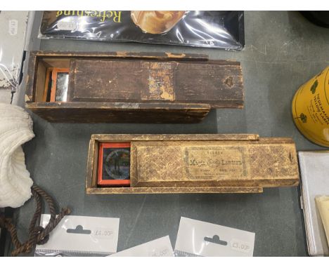 THREE SETS OF MAGIC LANTERN STRIP SLIDES IN TWO BOXES