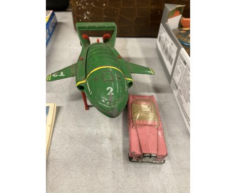 A TOY MODEL LAUTO THUNDERBIRD 2 PLANE AND A MATCHBOX LADY PENELOPE TOY CAR