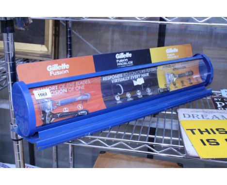 A GILLETTE RAZOR SHOP DISPLAY STAND