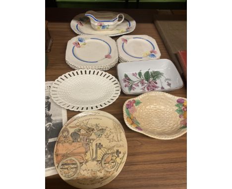 AN ASSORTMENT OF CERAMIC PLATES, BOWLS AND A GRAVY DISH