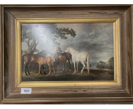 A FRAMED PRINT OF HORSES BY A LAKE