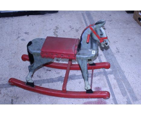 A RETRO WOODEN PAINTED CHILDS ROCKING HORSE