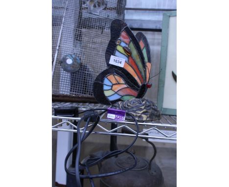A RETRO STYLE TIFFANY STYLE BUTTERFLY LAMP