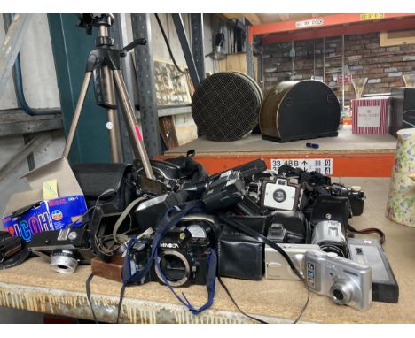 A LARGE COLLECTION OF VINTAGE CAMERAS AND ACCESSORIES TO INCLUDE SAMSUNG, MINOLTA, TRIPODS, FLASHES, ETC