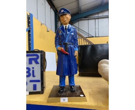 AN ESSO FORECOURT ATTENDANT FIGURE ON A WOODEN PLINTH MADE IN ENGLAND 56159 - 54 CM NOT INCLUDING THE BASE