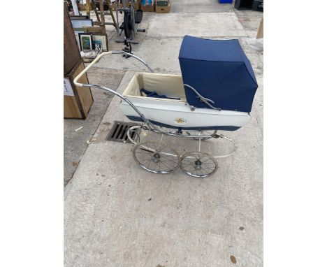 A VINTAGE PEDIGREE FOUR WHEELED PRAM