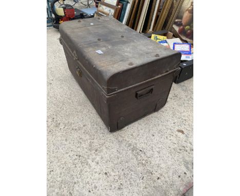 A VINTAGE METAL STORAGE TRUNK