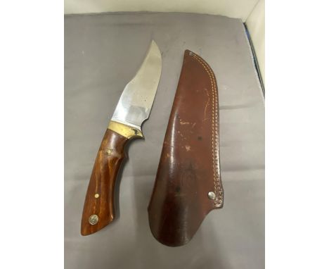 A MUELA  BOWIE KNIFE AND LEATHER SCABBARD - 15 CM BLADE - WOODEN GRIP - LENGTH - 29 CM