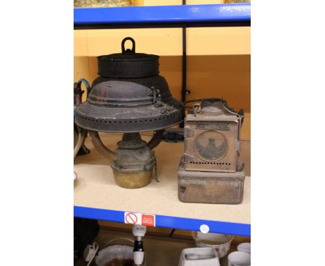 A VINTAGE RAILWAY LAMP WITH THE MAKERS LABEL, LAMP MANUFACTURING AND RAILWAY SUPPLIES LTD, LONDON AND AN ELI GRIFFITHS AND SO