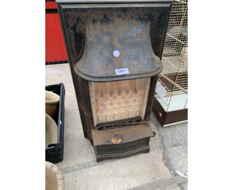 A VINTAGE CAST IRON GAS FIRE