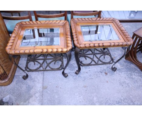 A PAIR OF HARDWOOD LAMP TABLES WITH INSET GLASS TOPS ON METALWARE BASES WITH ROPE EDGES