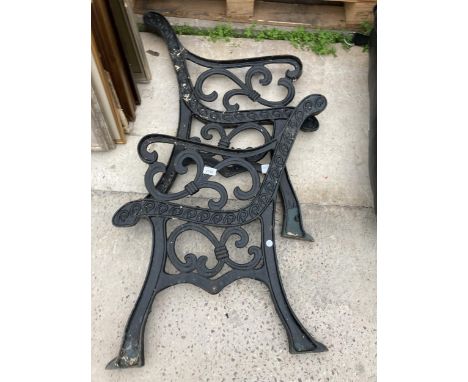 A PAIR OF DECORATIVE CAST BENCH ENDS