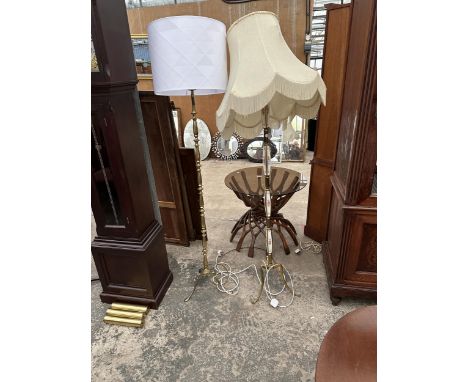 A BRASS AND CERAMIC STANDARD LAMP AND SHADE WITH BRASS DITTO