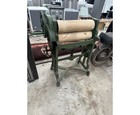 A VINTAGE CAST IRON MANGLE