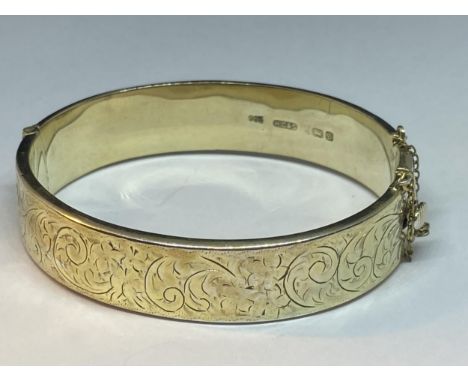 A HALLMARKED BIRMINGHAM SILVER BANGLE
