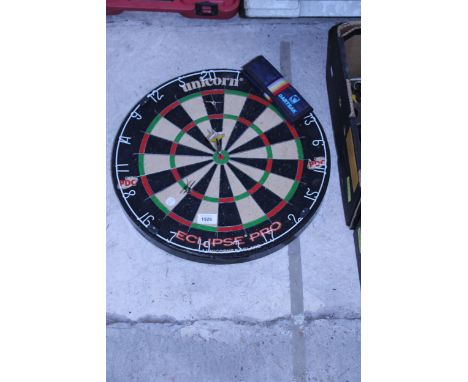 A UNICORN ECLIPSE PRO DARTBOARD AND A SET OF DARTS