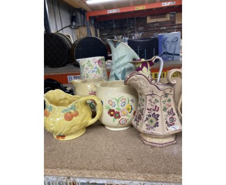 A QUANTITY OF DECORATED CERAMIC JUGS TO INCLUDE CARLTONWARE, ARTHUR WOOD &amp; SONS, CROWN BURSLEM, ETC.,