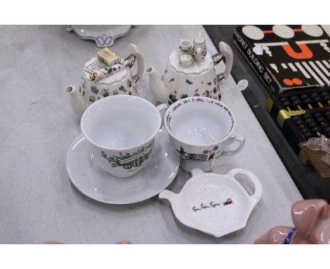 TWO MINIATURE PORTMERION TEAPOTS TOGETHER WITH A HENDRICK'S GIN TEACUP AND SAUCER, CHARLES DICKENS CUP AND TEABAG TIDY