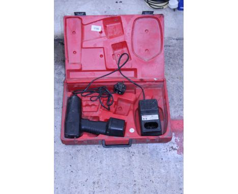 A SNAP-ON BATTERY IMPACT WRENCH WITH CARRY CASE AND CHARGER