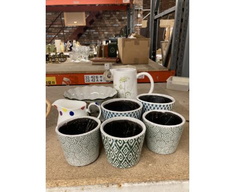 AN ASSORTMENT OF GARDEN POTS AND CERAMIC JUGS