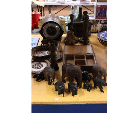A LARGE QUANTITY OF TREEN ITEMS TO INCLUDE ELEPHANTS, A SMALL WORK BOX, SMITHS MANTLE CLOCK, CANDLESTICKS, ETC