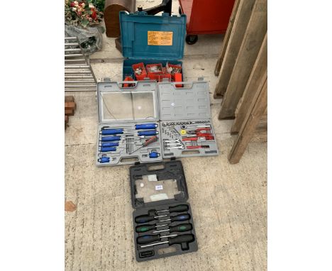 AN ASSORTMENT OF TOOLS AND HARDWARE TO INCLUDE TWO SCREW DRIVER SETS AND A SOCKET SET