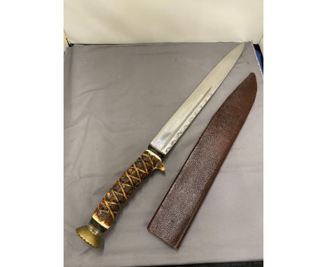 A LARGE HUNTING KNIFE AND LEATHER SCABBARD - 30 CM BLADE - CARVED ANTLER HORN GRIP - LENGTH - 48 CM