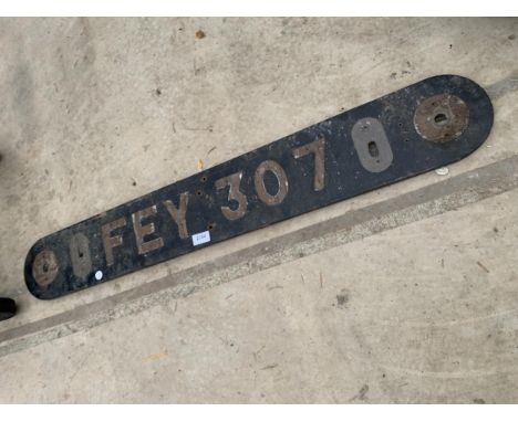 A VINTAGE WOODEN FEY 307 SIGN
