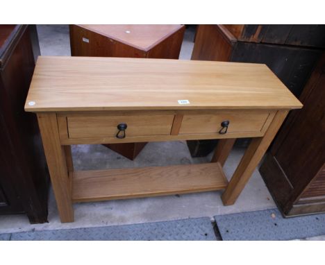 AN OAK CONSOLE TABLE ENCLOSING TWO DRAWERS, 39.5" WIDE