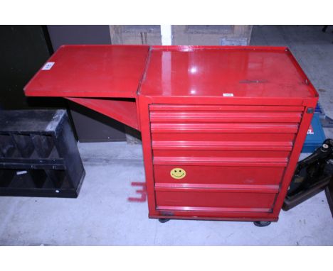 A METAL FOUR WHEELED TROLLEY WORKSHOP TOOL CHEST