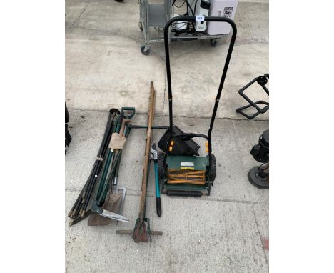 AN ASSORTMENT OF GARDEN TOOLS TO INCLUDE A PUSH MOWER, RAKES, DRAINING RODS AND A SPADE ETC