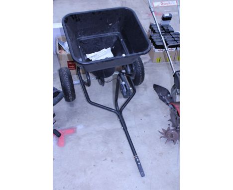 A COBRA TS45 GARDEN TRACTOR SPREADER