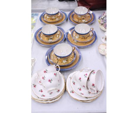 FIVE JAPANESE IRIDESCENT TRIOS WITH A TREE AND BIRD DESIGN PLUS COLCLOUGH CUPS, SAUCERS AND SIDE PLATES