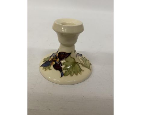 A MOORCROFT COLUMBINE CANDLESTICK