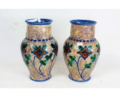 Upsala-Ekeby, pair of Swedish pottery vases, each of baluster form, painted with orange flowers of a mottled ground, stamped 