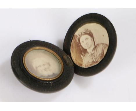 Victorian vulcanite locket, enclosing two portrait minitures of a lady and a gentleman, surrounded by heart shaped geometric 