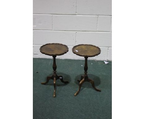 Pair of 20th century walnut wine tables, each with piecrust tops and tripod legs (2)