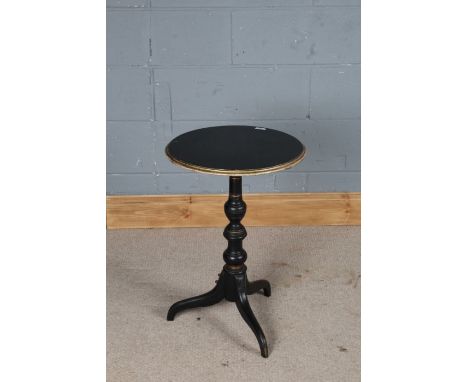 Neoclassical style occasional table, the ebonised and gilt circular top raised on a turned stem and tripod legs, 44cm diamete