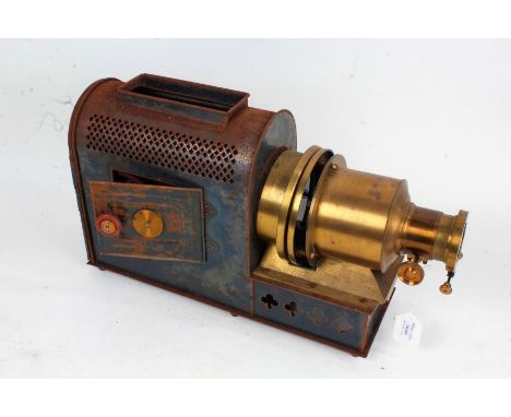 Early 20th century tin plate and brass magic lantern, together with two wooden boxes of slides - with scenes of cities and bu