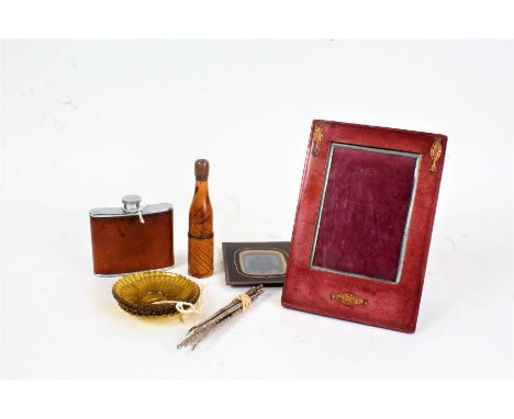 Works of art to include red leather and copper mounted picture frame, brown leather mounted hip flask, nut picks, two glass c