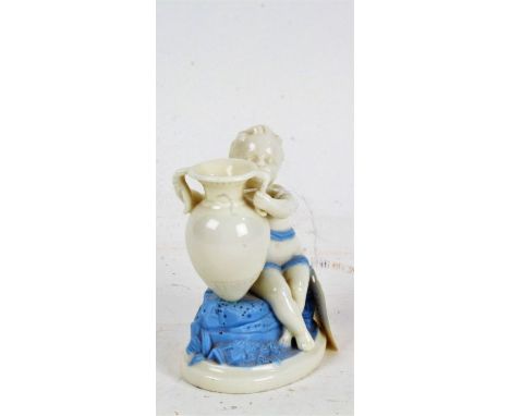 Royal Worcester porcelain vase, in the form of a seated cherub holding an urn, with blue painted naturalistic base, 13cm high