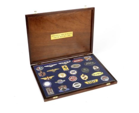 A cased set of 'Badges of the World's Great Motor Cars' by Danbury Mint,comprising 25 motor car silver-plated and gold-plated