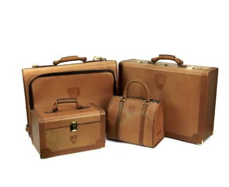 A rare four-piece set of leather luggage for Lamborghini Diablo, by Schedoni of Modena, Italy, 1990s,each in tan leather with