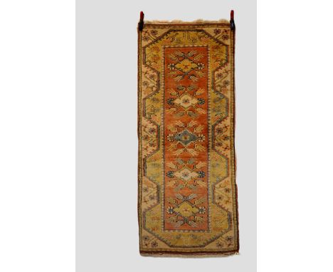 Two Melas rugs, west Anatolia, late 20th century, the first, 6ft. 6in. X 2ft. 10in. 1.98m. X 0.86m.; the second 4ft. 5in. X 2