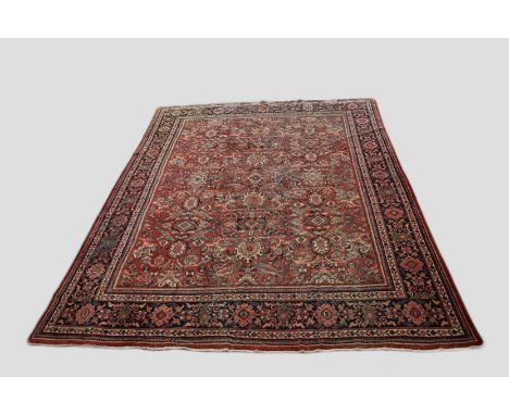 Mahal carpet, north west Persia, circa 1920s-30s, 14ft. 3in. X 11ft. 1in. 4.34m. X 3.38m. Overall wear, heavy in some places;