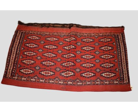 Two Yomut Turkmen flatweave chuvals, Turkmenistan, late 19th century, the first, 2ft. 2in. X 3ft. 6in. 1.07m. X 0.66m. Brocad