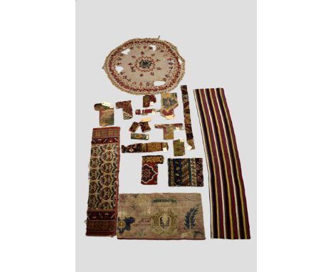 Interesting study collection of 16th-19th century Persian and other rug and carpet fragments. (19) 