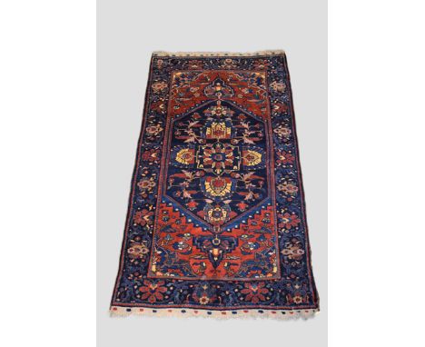 Bakhtiari carpet, Chahar Mahal Valley, south west Persia, circa 1920s-30s, 10ft. 5in. x 5ft. 7in. 3.17m. x 1.70m. Note the wo