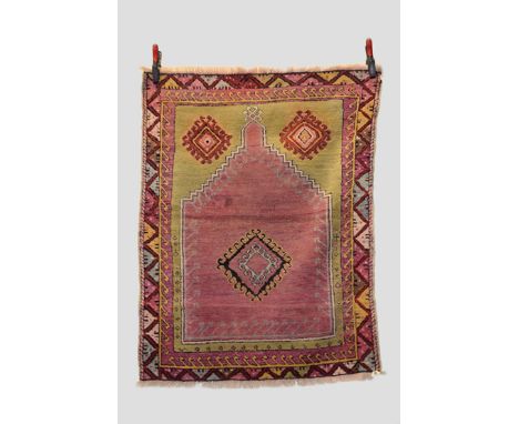Two Kirshehir rugs, central Anatolia, early 20th century, the first a prayer rug, 4ft. 2in. X 3ft. 2in. 1.27m. X  0.97m. Over